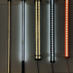 Architectural LED tubular lights with exposed LED pixel arrays and decorative inner structures – industrial design tube lighting in warm and cool white colors