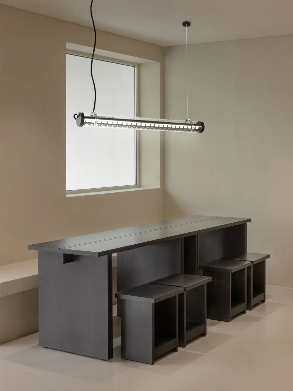 Rosa wall-mounted architectural tubular lights installed at a residential entry porch — compact façade lighting for semi-outdoor use (MANI Lighting)