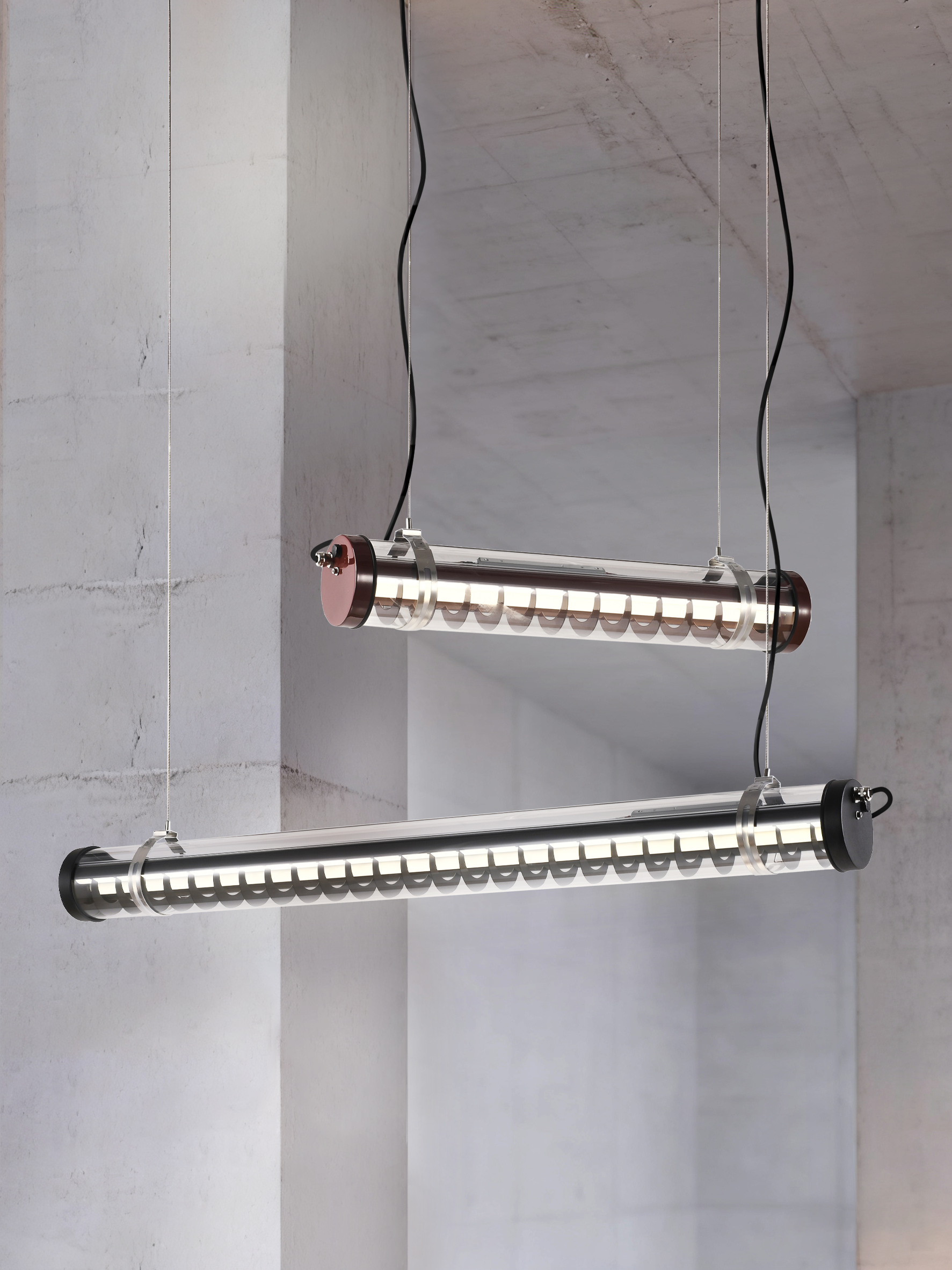 Rosa wall-mounted architectural tubular lights installed at a residential entry porch — compact façade lighting for semi-outdoor use (MANI Lighting)