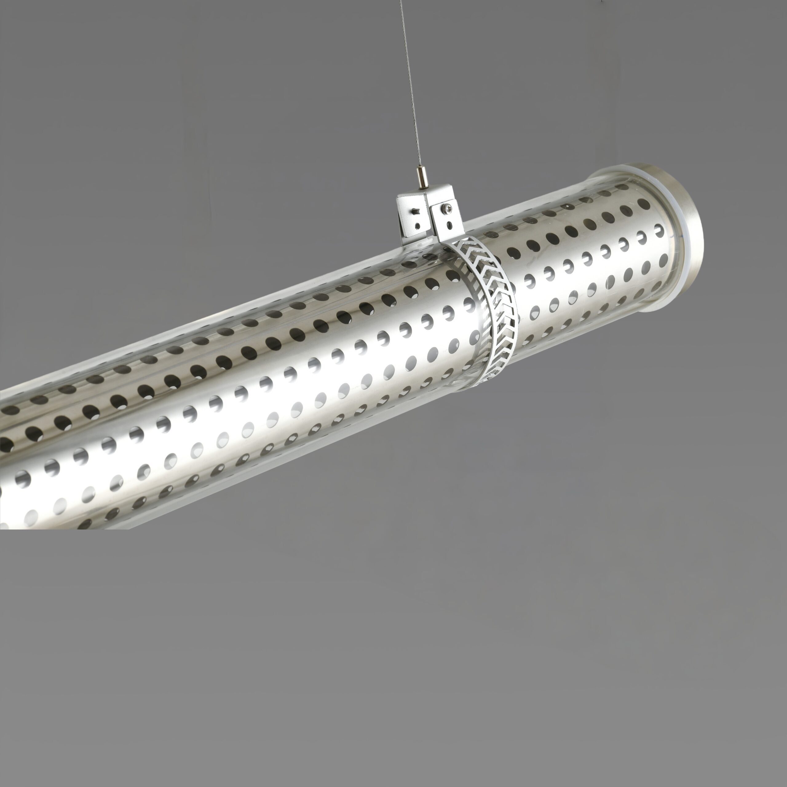 Perfo 360 architectural tubular luminaire with perforated stainless steel insert and 360° emission