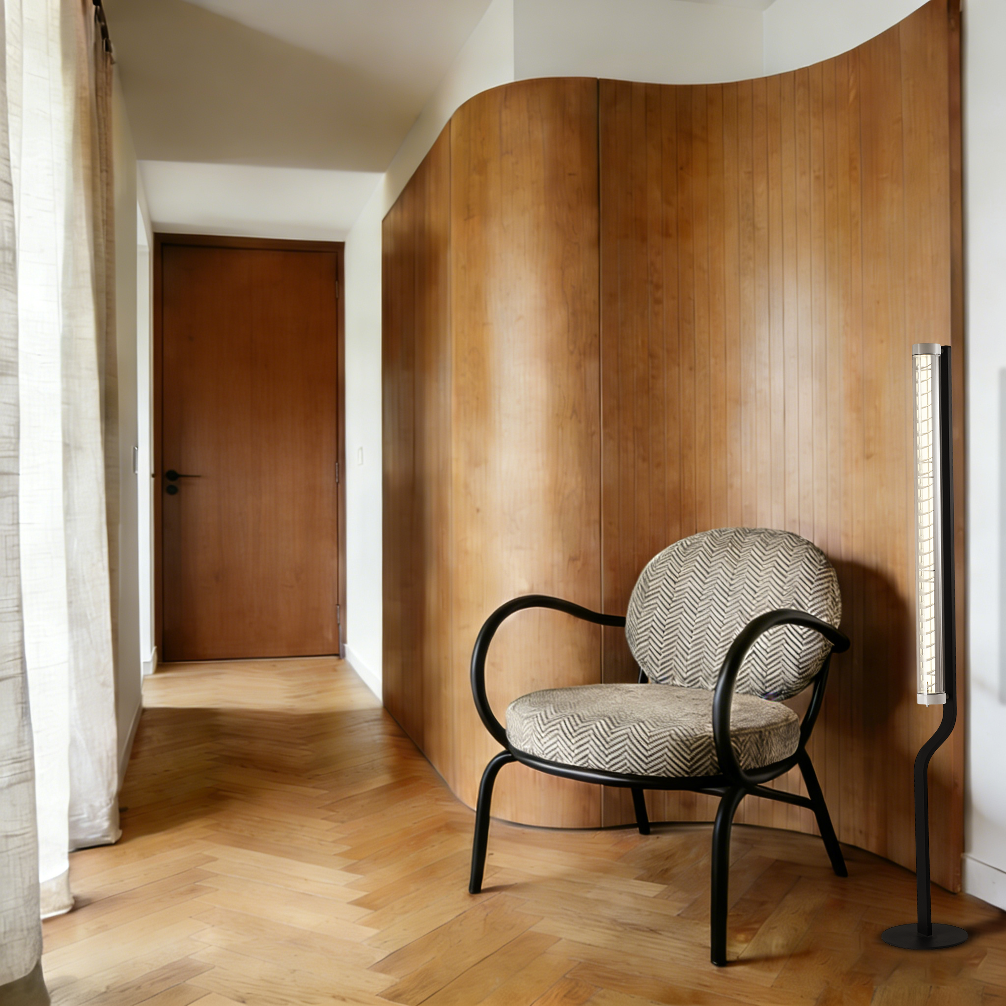 Flow Stand architectural tubular floor lamp with curved steel stand and integrated louver optics