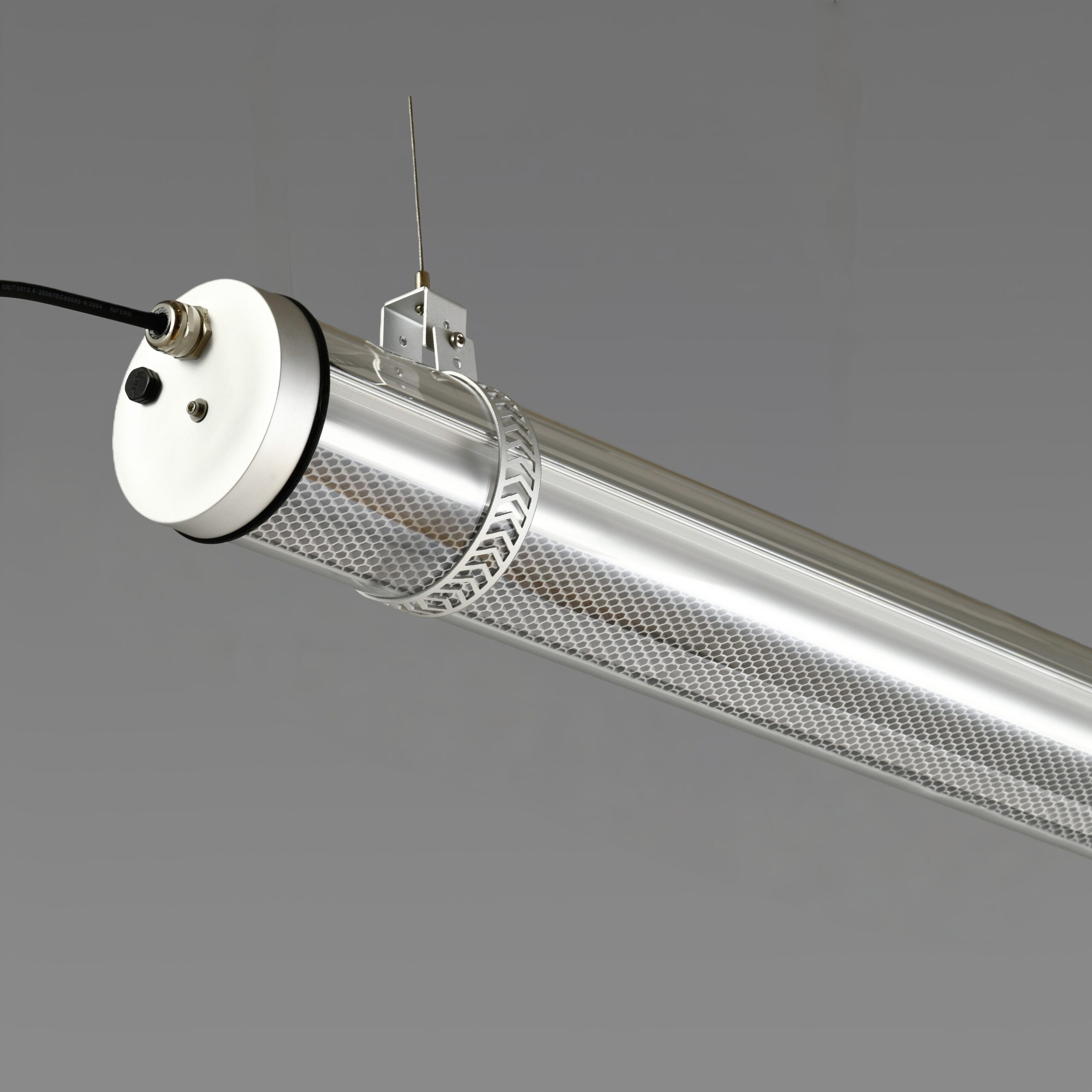 MANI Tubular luminaire with integrated honeycomb louver for glare control