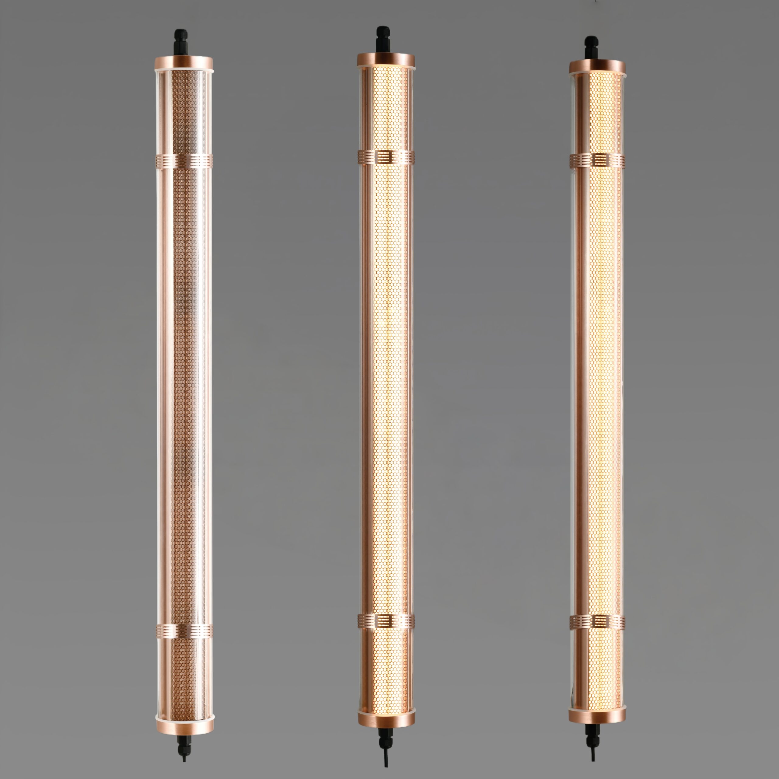 Titan architectural tubular luminaire with integrated honeycomb optic, wall mounted installation, warm brass-toned metal finish