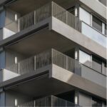 This project features wall-mounted architectural tubular luminaires designed for outdoor residential environments. The solution ensures consistent light output, long-term durability and seamless integration with modern façade systems.