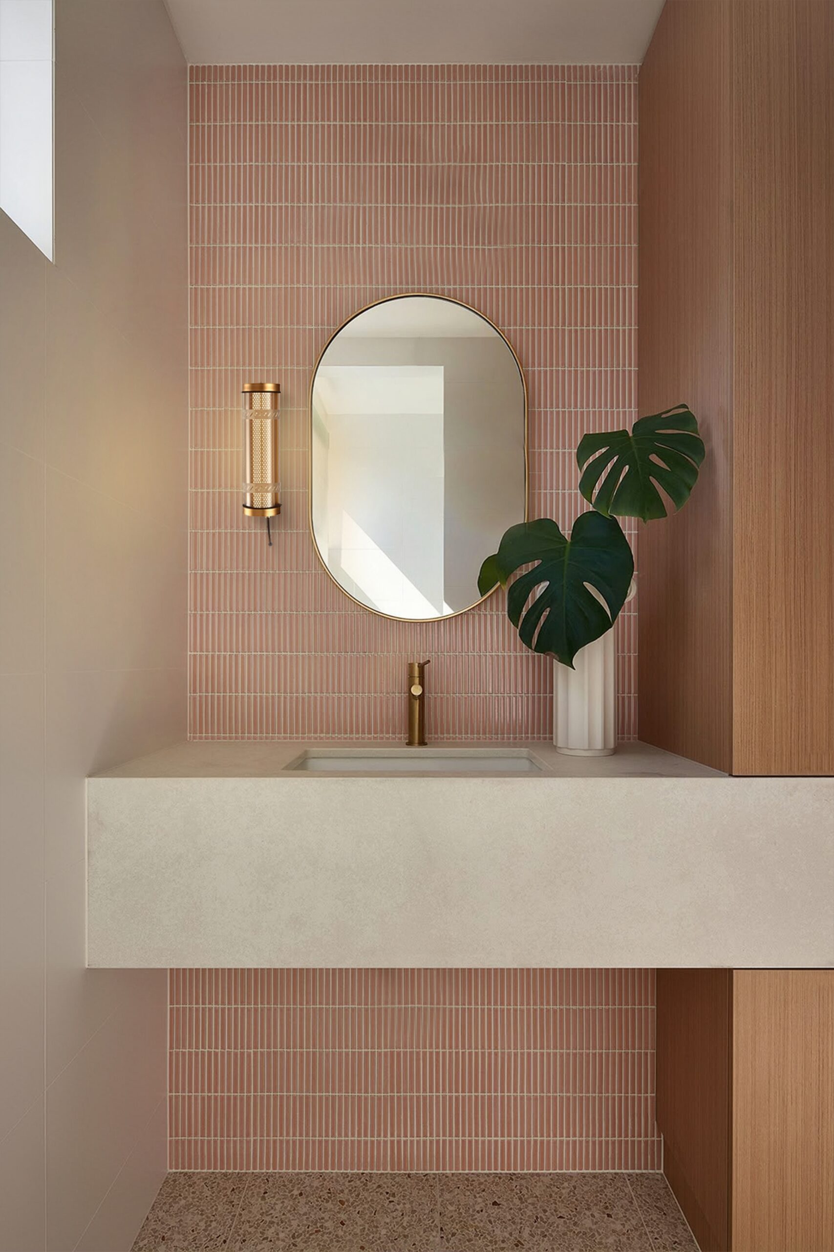 Arno IP67 IK10 architectural tubular wall lights installed on an outdoor building façade for long-term weather-resistant lighting