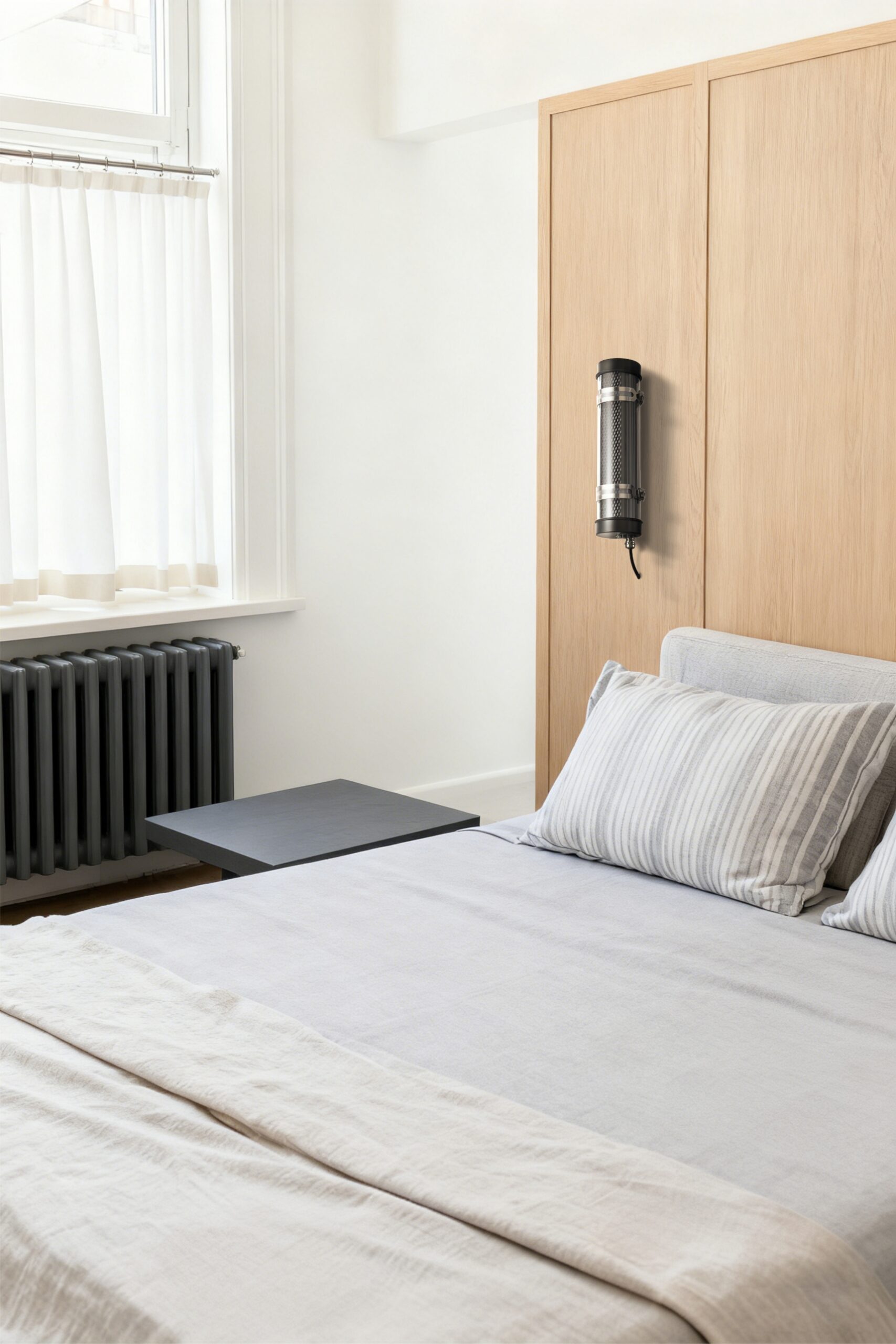 Arno IP67 IK10 architectural tubular wall lights installed on an outdoor building façade for long-term weather-resistant lighting