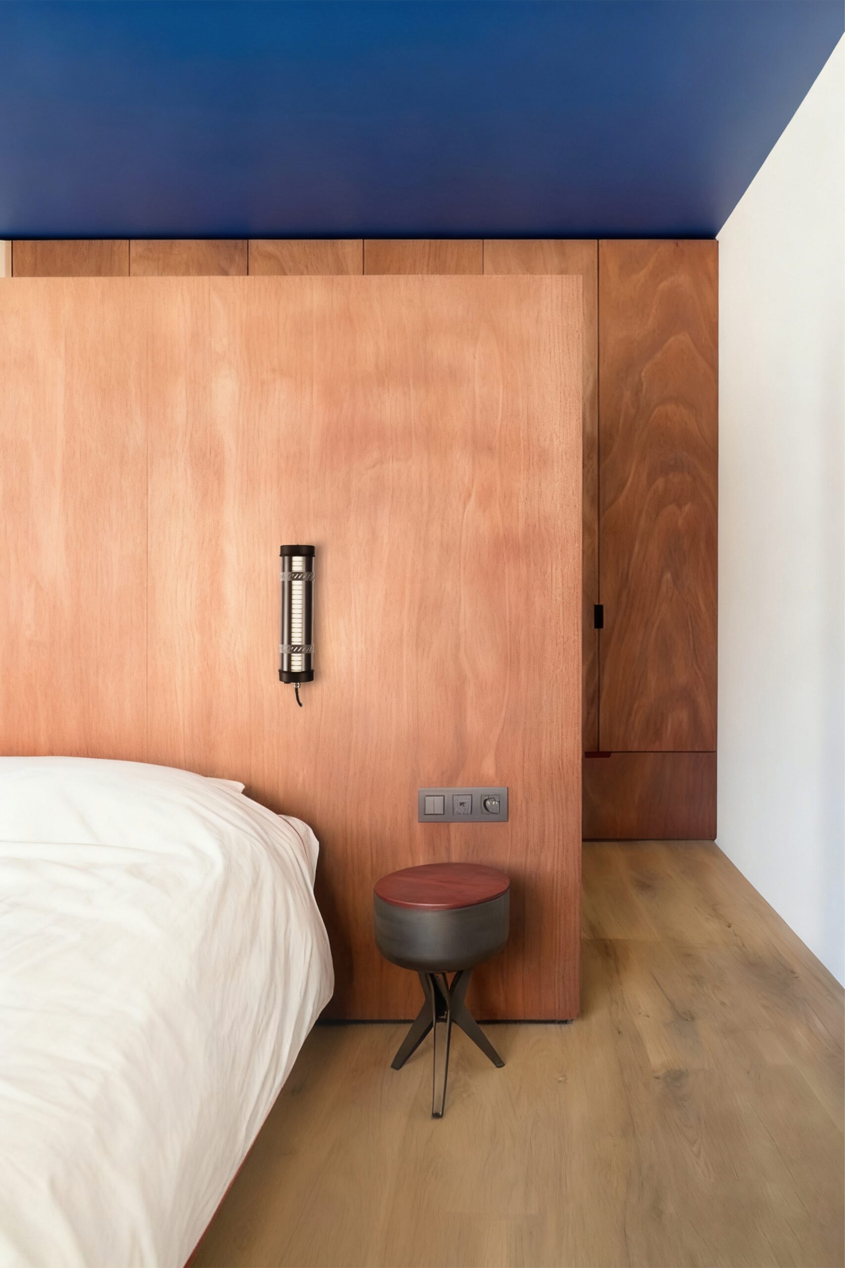 Arno IP67 IK10 architectural tubular wall lights installed on an outdoor building façade for long-term weather-resistant lighting