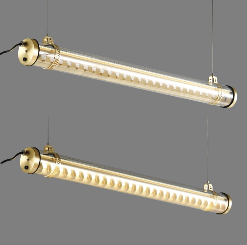 Corbusier decorative architectural tubular light with brass metal grille and transparent polycarbonate tube