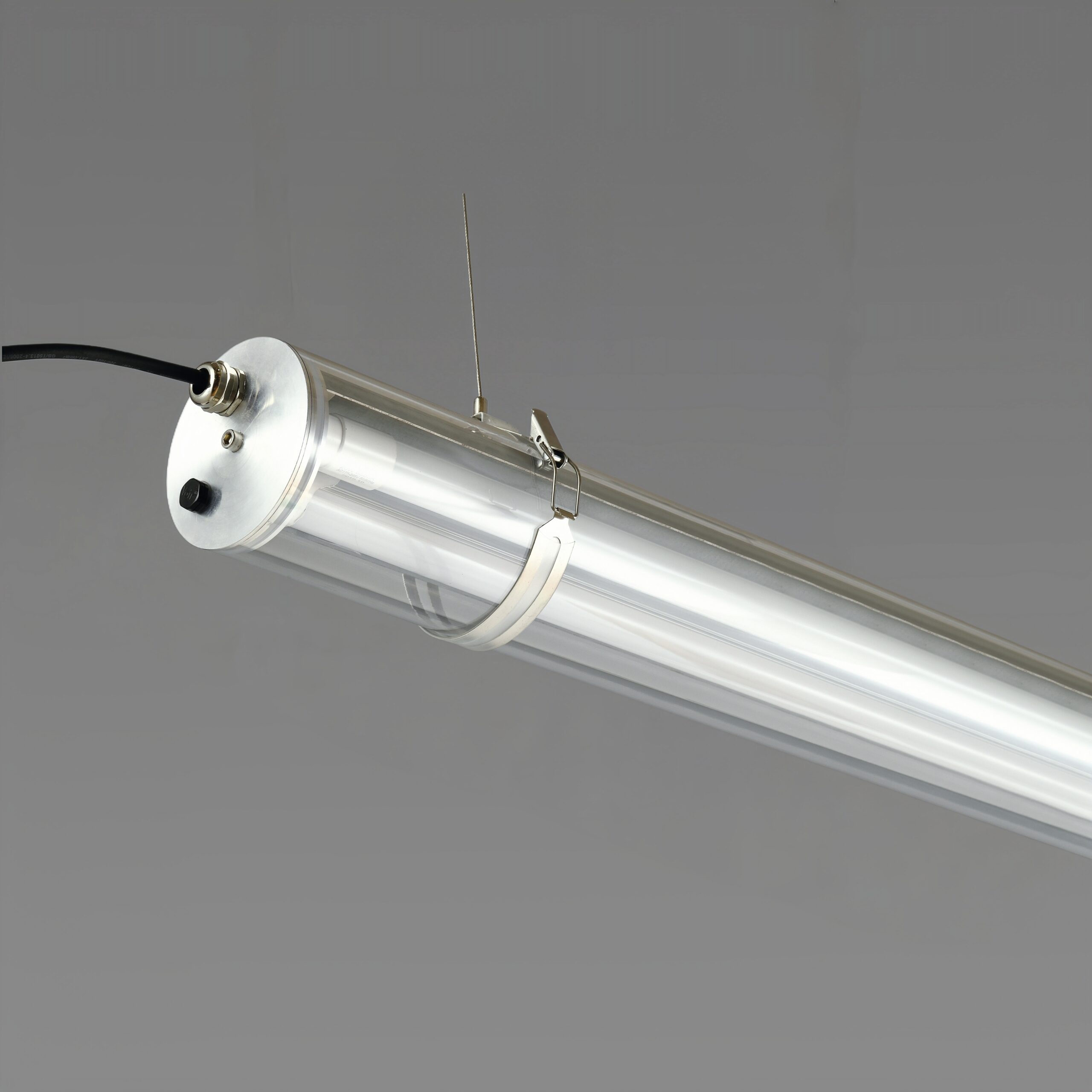 MANI Commercial tubular luminaire featuring an internal replaceable T8 LED tube, suitable for suspension or surface mounting