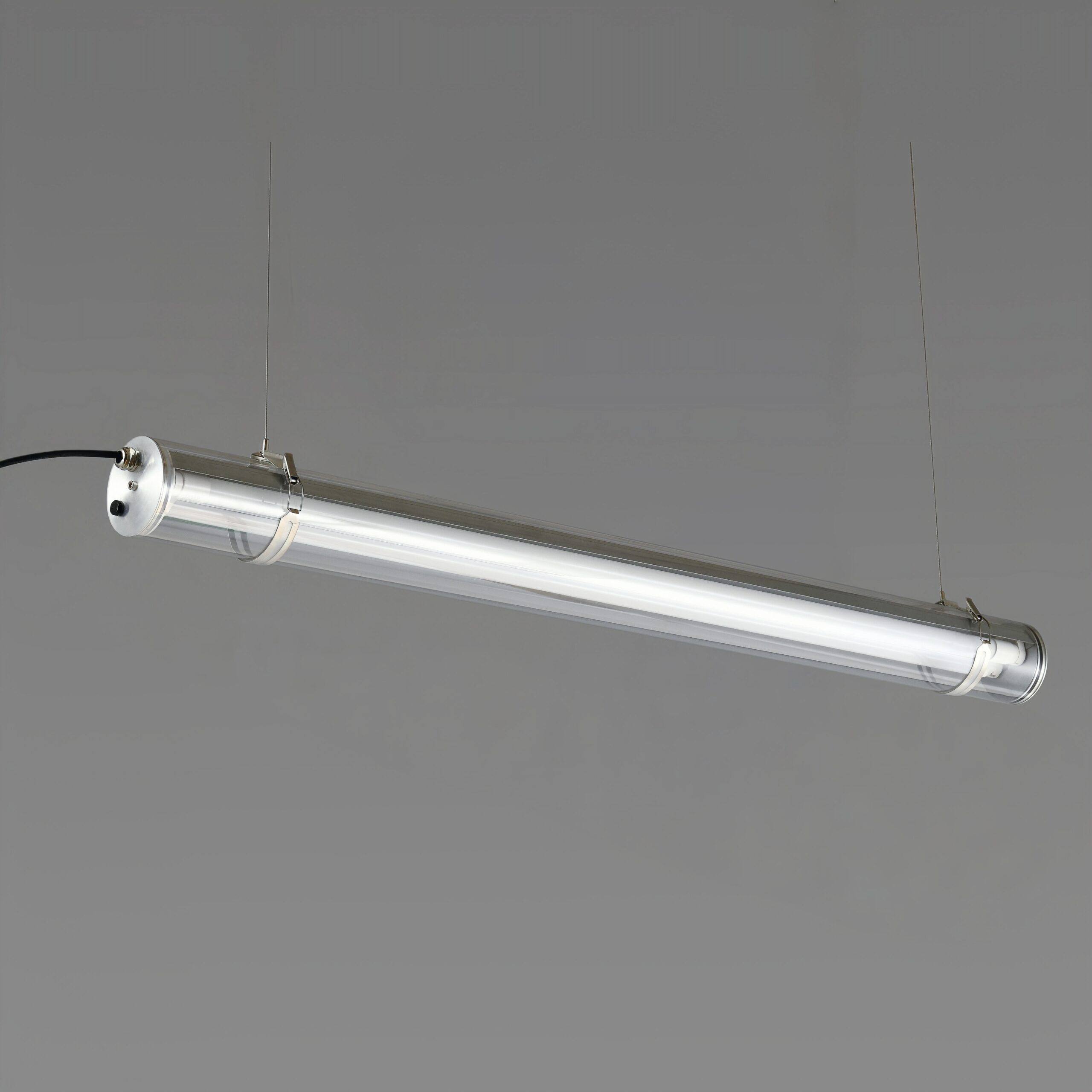 MANI Commercial tubular luminaire featuring an internal replaceable T8 LED tube, suitable for suspension or surface mounting