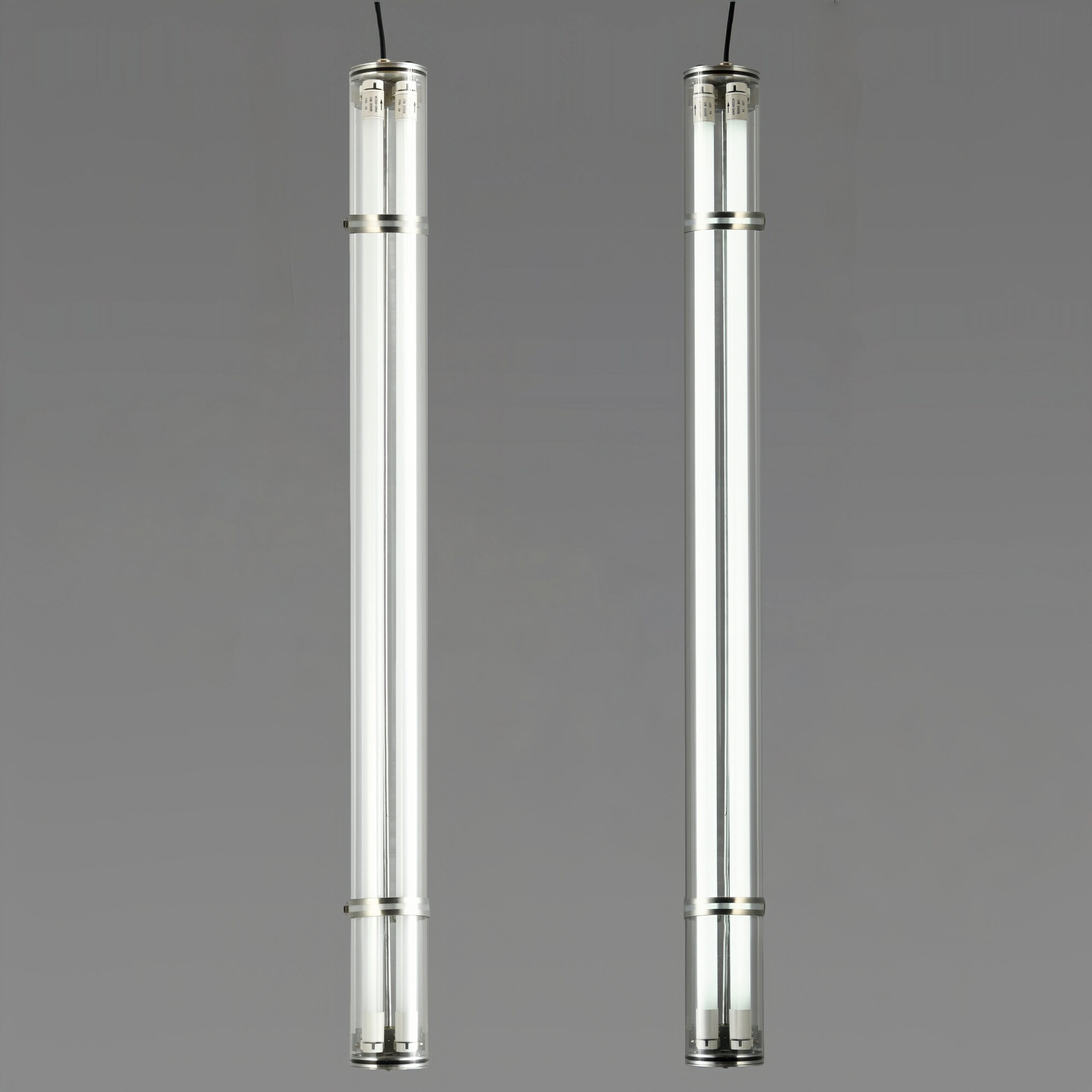 MANI Commercial tubular luminaire featuring an internal replaceable T8 LED tube, suitable for suspension or surface mounting