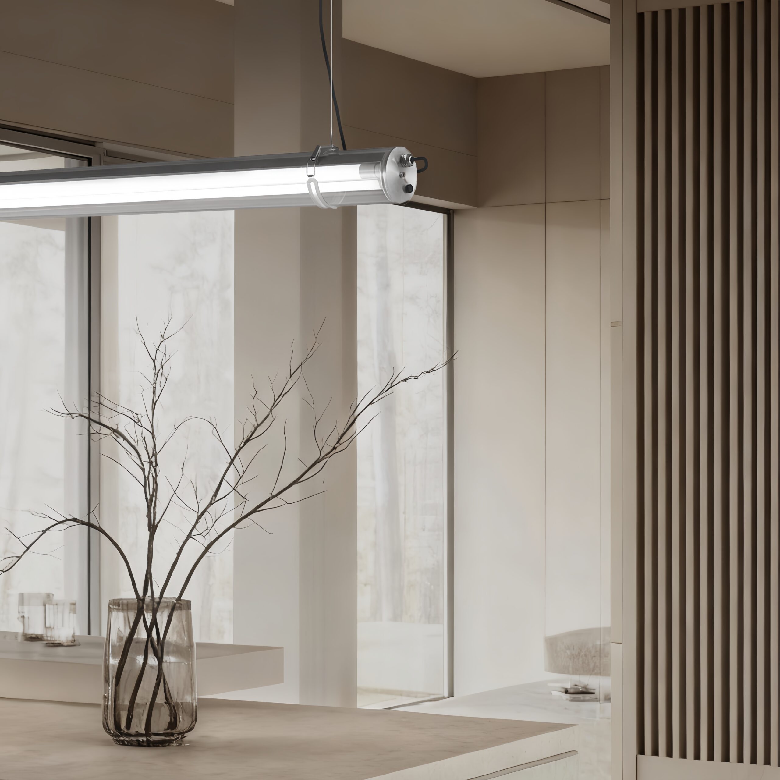 MANI Commercial tubular luminaire featuring an internal replaceable T8 LED tube, suitable for suspension or surface mounting