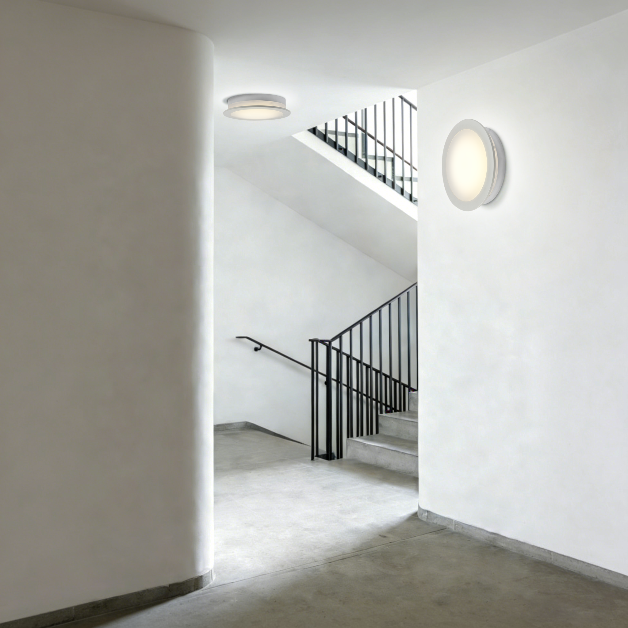 IP65 LED ceiling bulkhead light used in stair landing area to ensure safe and reliable building circulation lighting