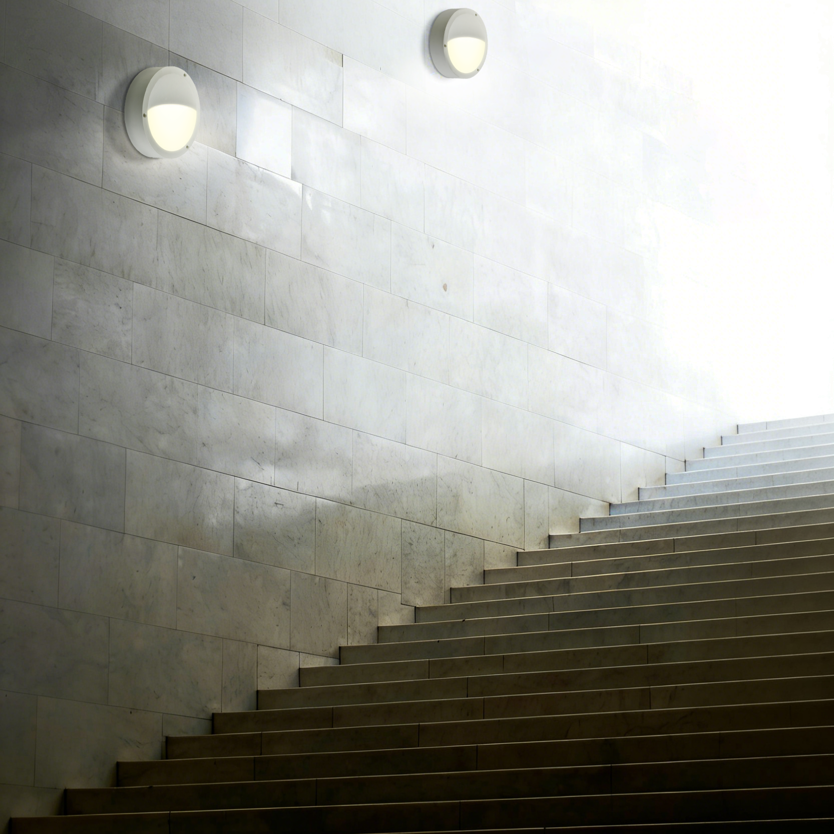 IP65 LED wall light used in public building staircase ensuring reliable indoor circulation lighting