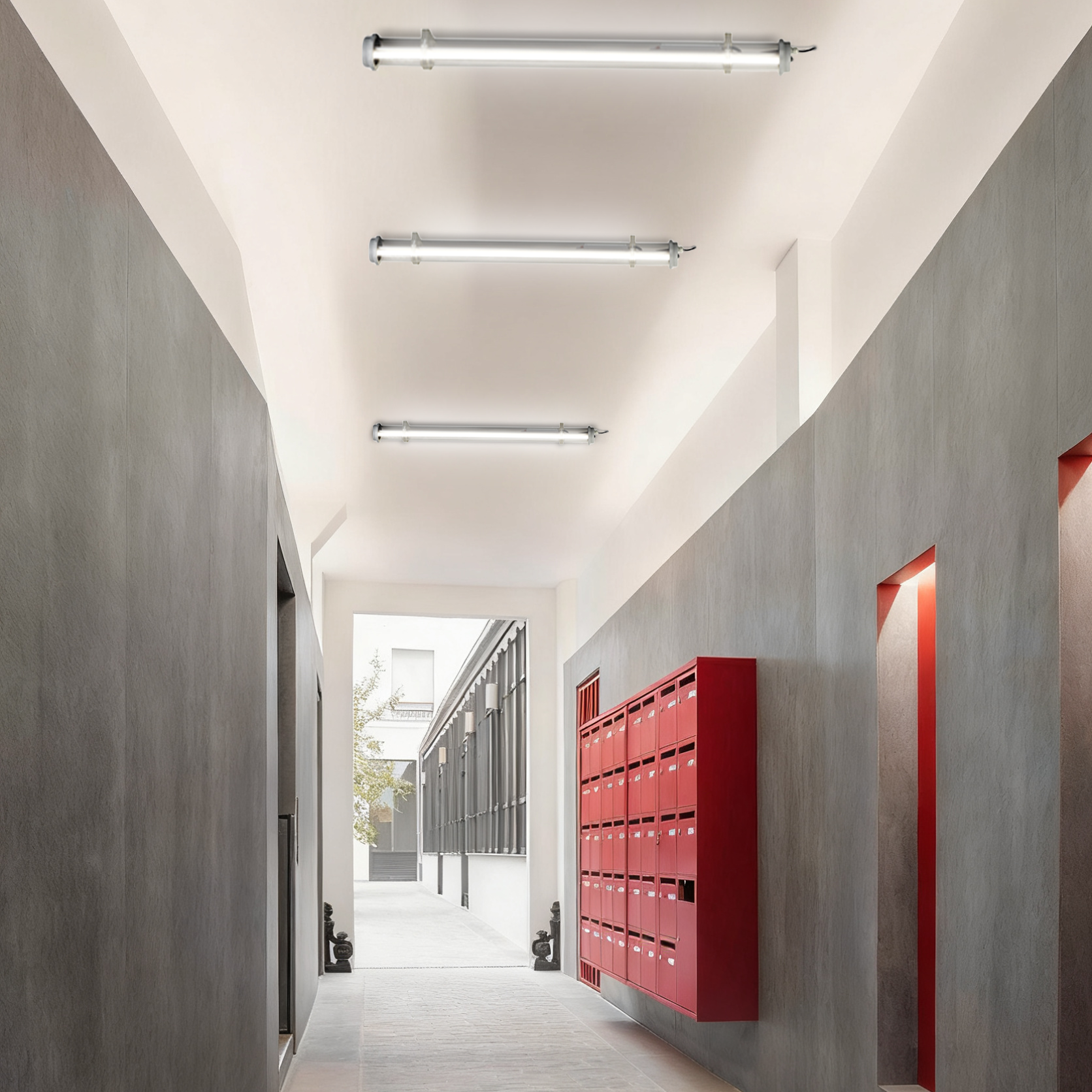 Semi-open outdoor walkway with ceiling-mounted tubular LED lights providing route guidance and safe circulation.