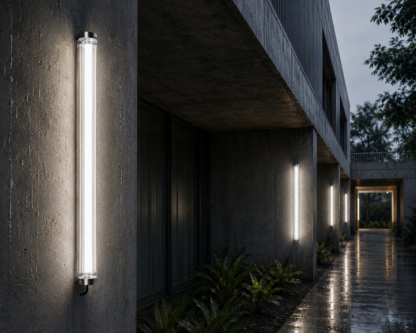 Rainy outdoor corridor with wall-mounted tubular LED lights providing weather-resistant illumination and route guidance.
