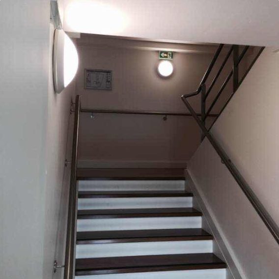 MC-802 LED bulkhead light installed in a stairwell